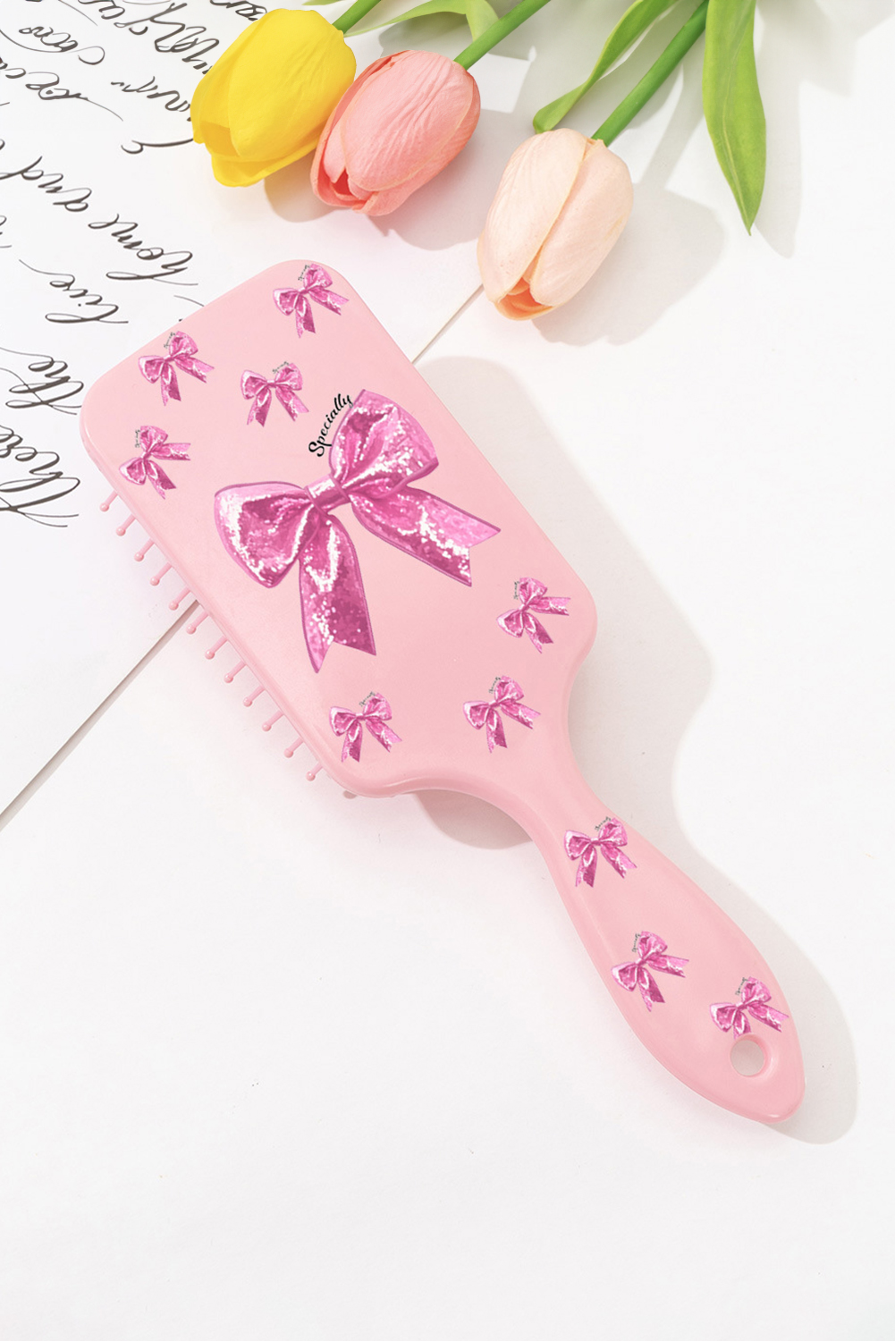 Gossamer Pink Glitter Bow Print Air Cushion Comb
